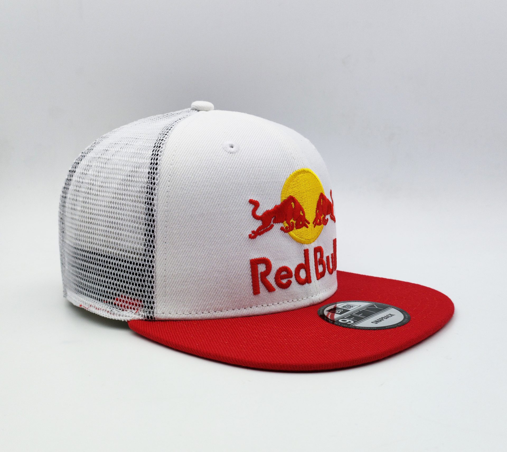 white red bull cap with red flat brim